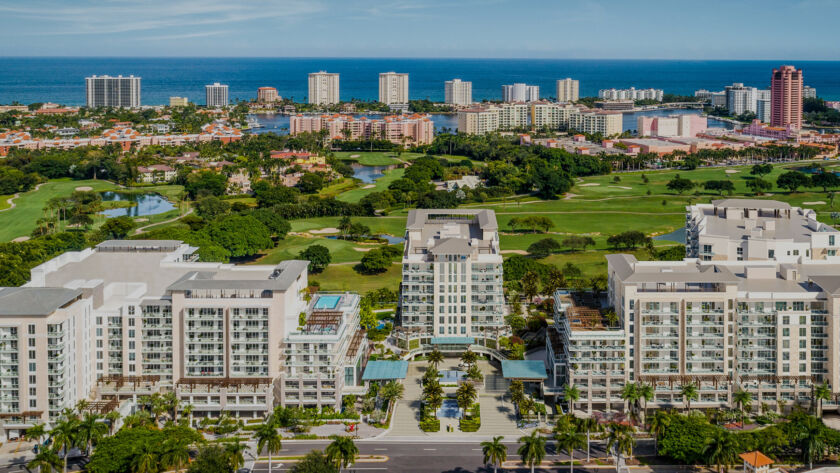 Aerial view of Alina Residences Boca Raton overlooking the golf course and ocean horizon